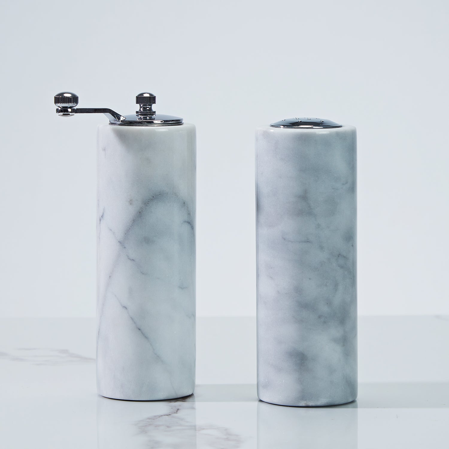 French White Marble Salt and Pepper Set with Grey Veining and Stainless Steel Shaker Plate for Stylish Kitchen and Dining Room Use