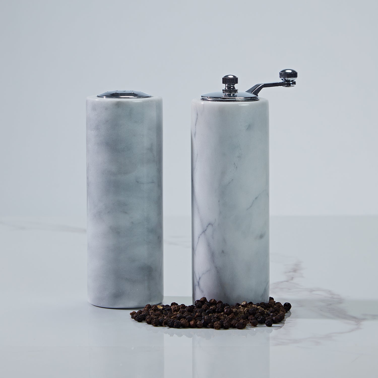 French White Marble Salt and Pepper Set with Grey Veining and Stainless Steel Shaker Plate for Stylish Kitchen and Dining Room Use