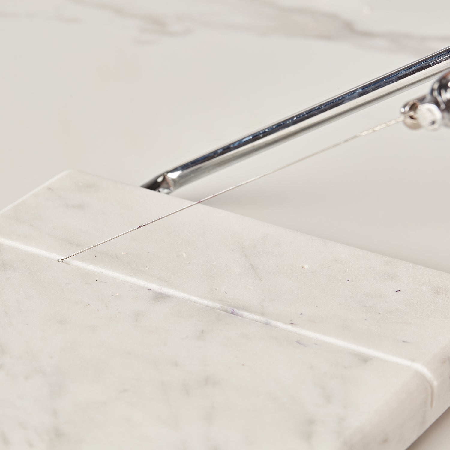 White Marble Cheese Board with Stainless Steel Slicer - Unique Grey Veining and Grooved Design for Dining Room and Kitchen Elegance