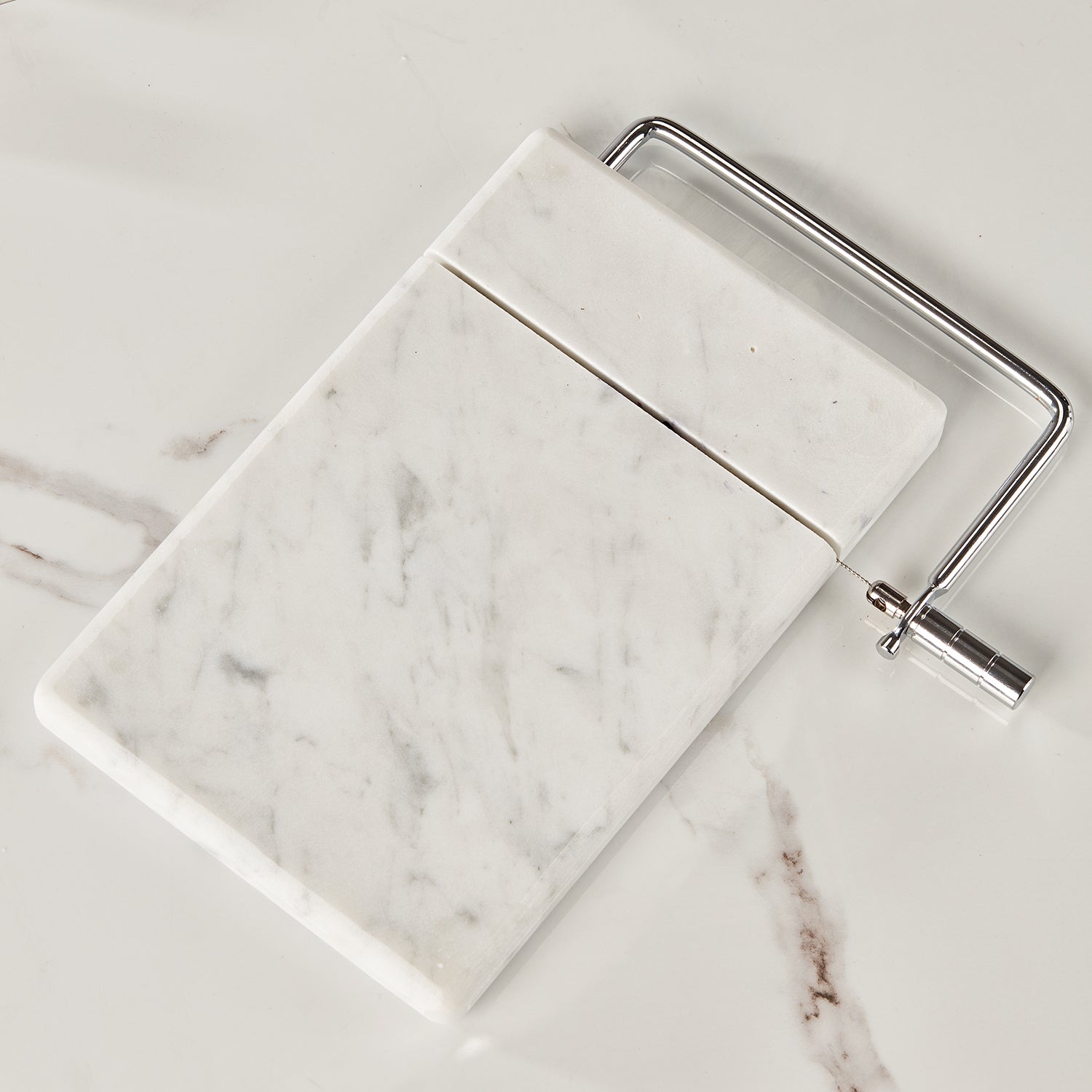 White Marble Cheese Board with Stainless Steel Slicer - Unique Grey Veining and Grooved Design for Dining Room and Kitchen Elegance