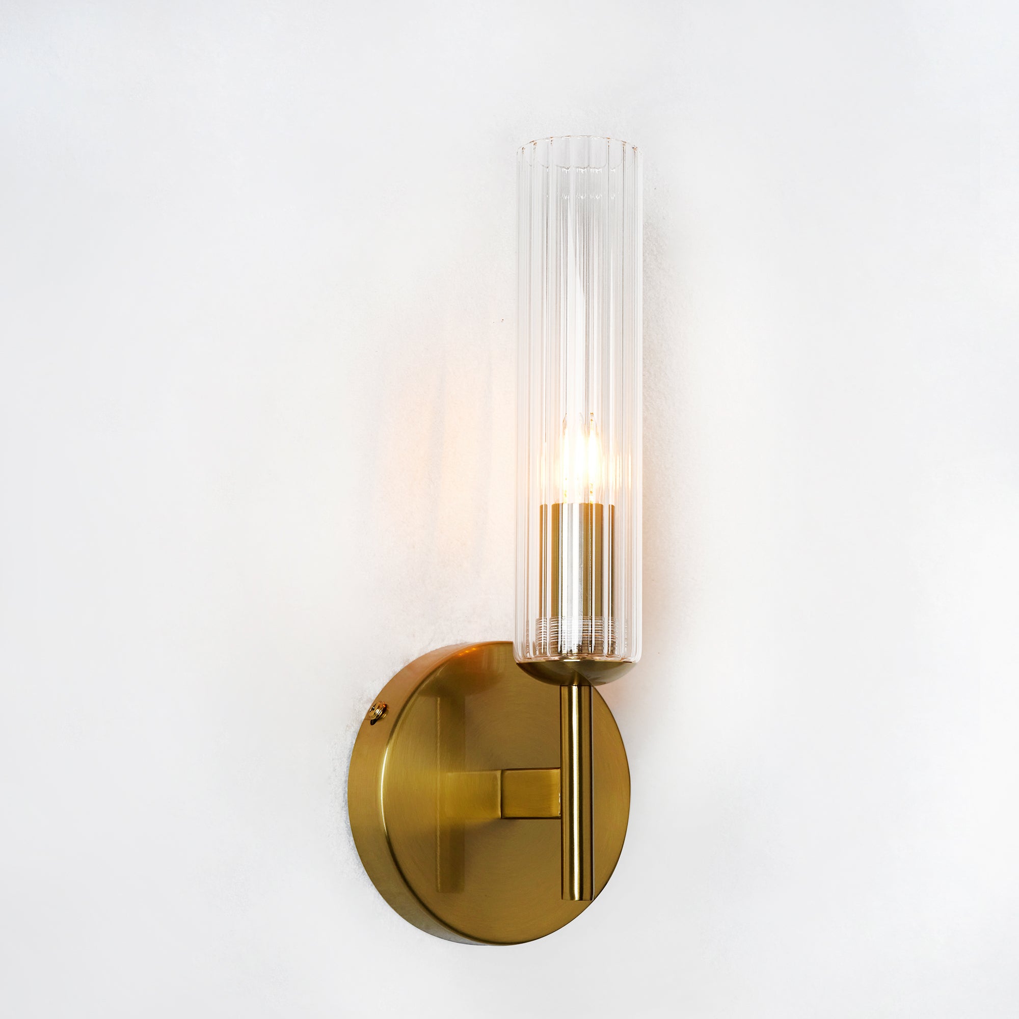 Antique Bronze Tube Sconce with Ribbed Glass Shade and Cylindrical Design for Versatile Indoor Lighting - Perfect for Bathroom and Bedroom Wall Sconces