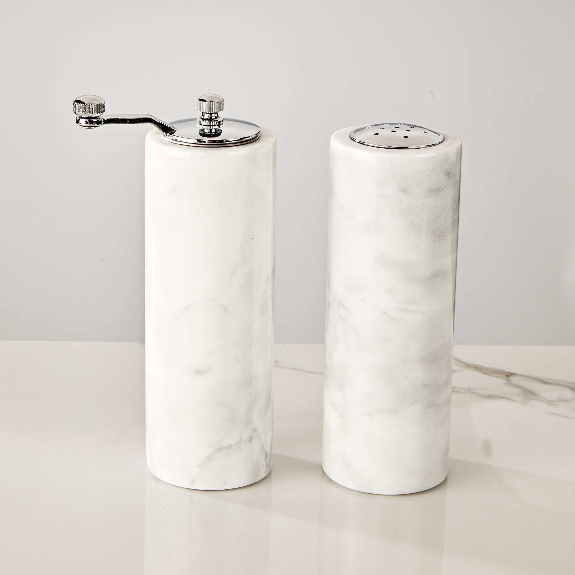 French White Marble Salt and Pepper Set with Grey Veining and Stainless Steel Shaker Plate for Stylish Kitchen and Dining Room Use