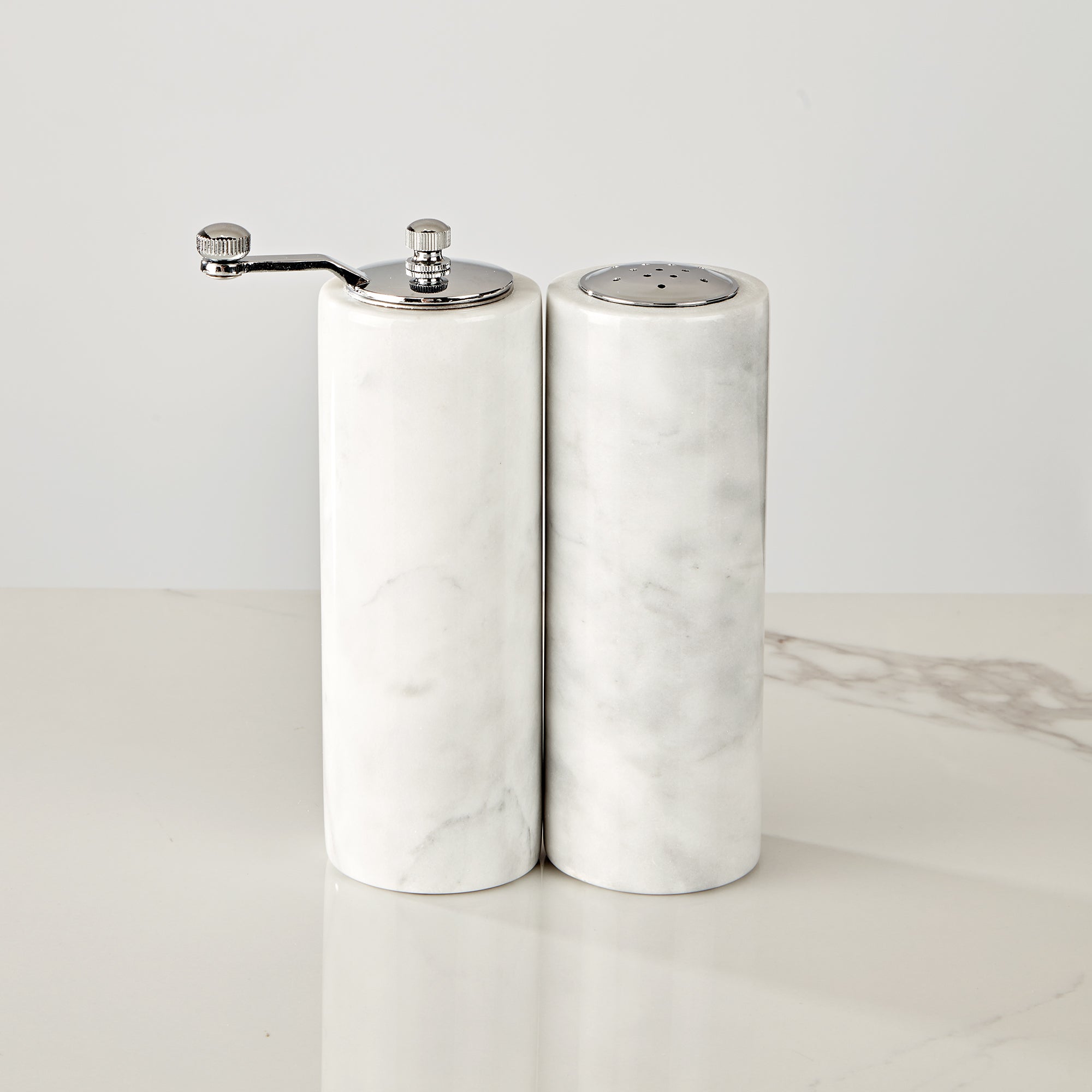 French White Marble Salt and Pepper Set with Grey Veining and Stainless Steel Shaker Plate for Stylish Kitchen and Dining Room Use